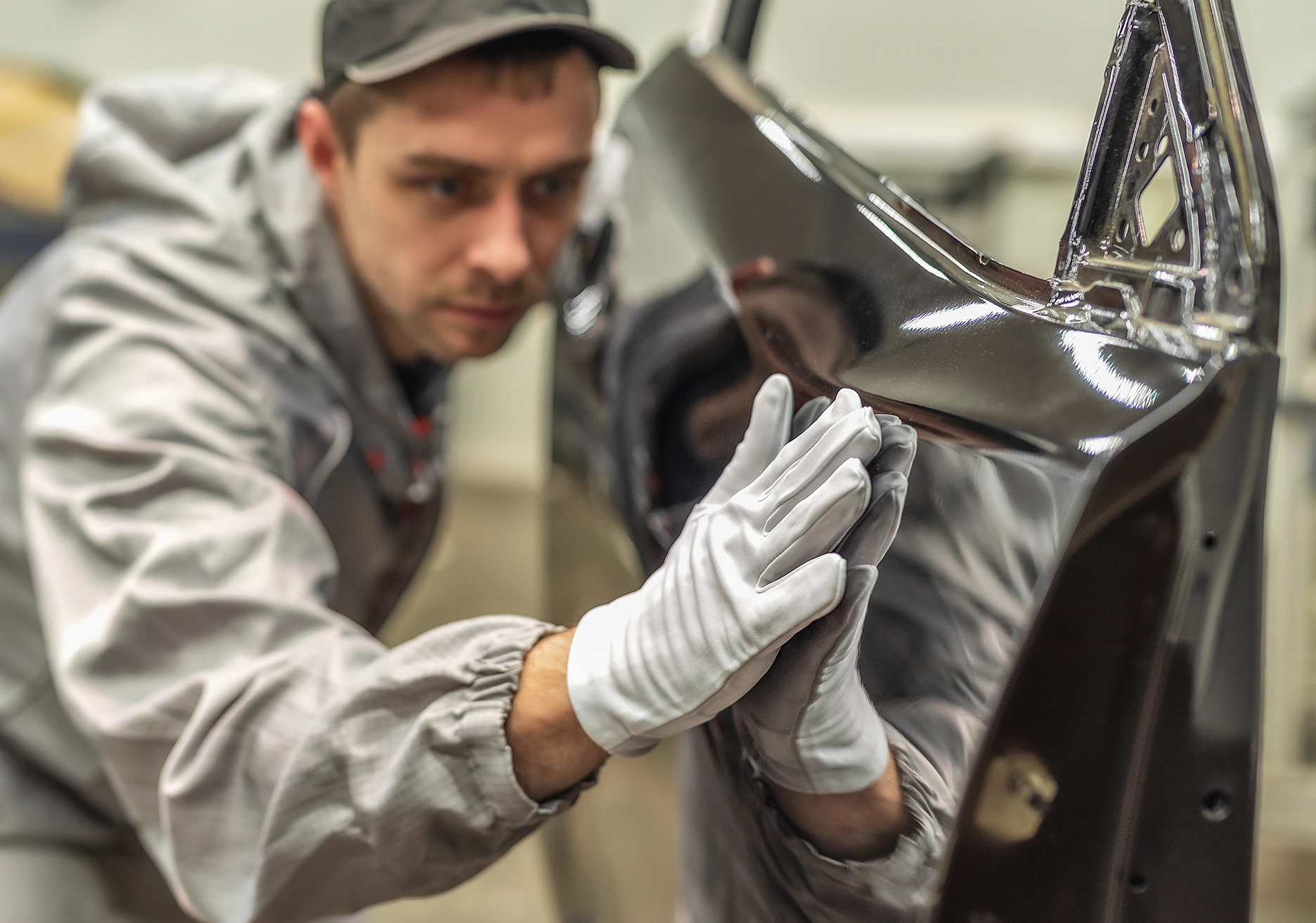Body shop technician working on a vehicle
